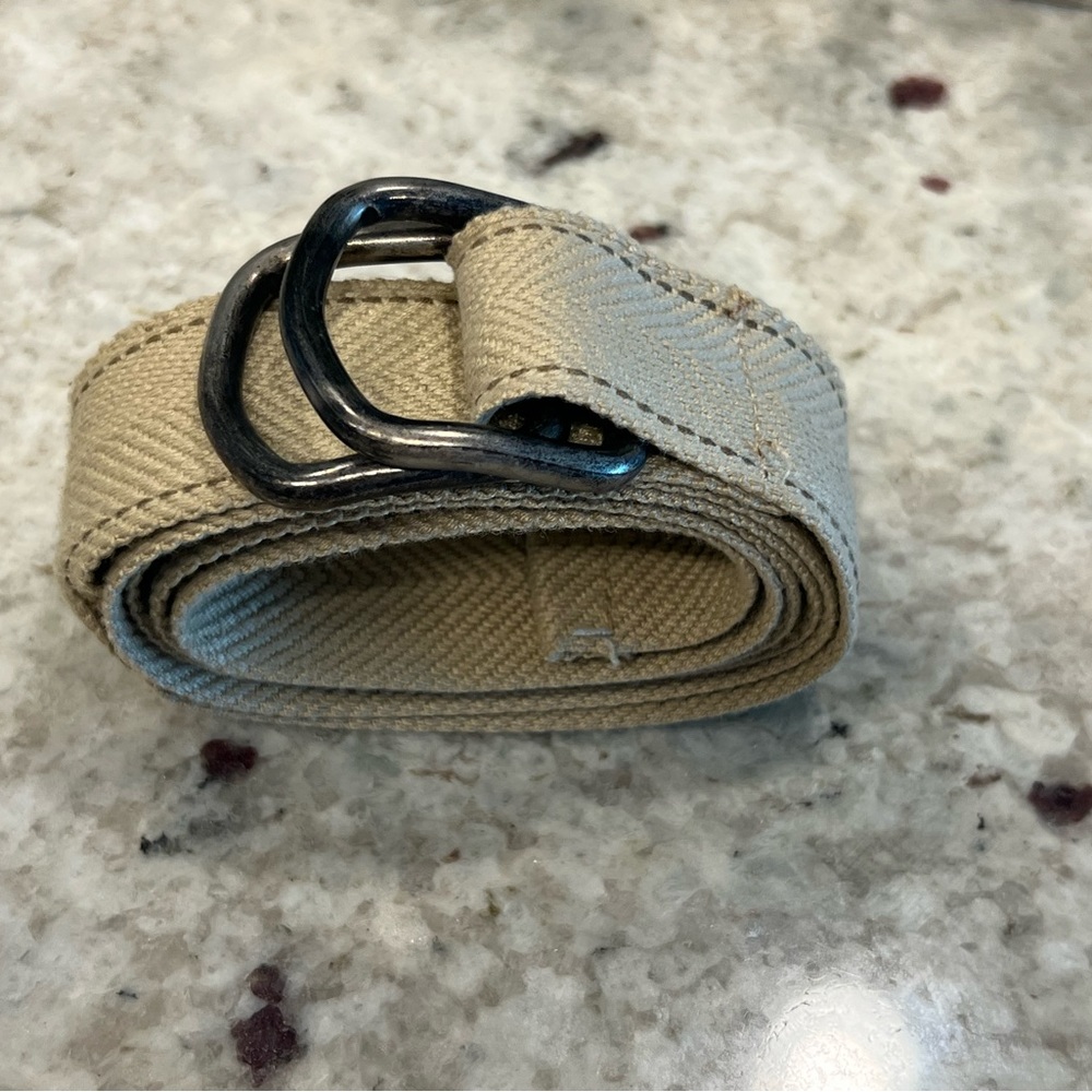 Beige Canvas belt. See pic for size. Great condition